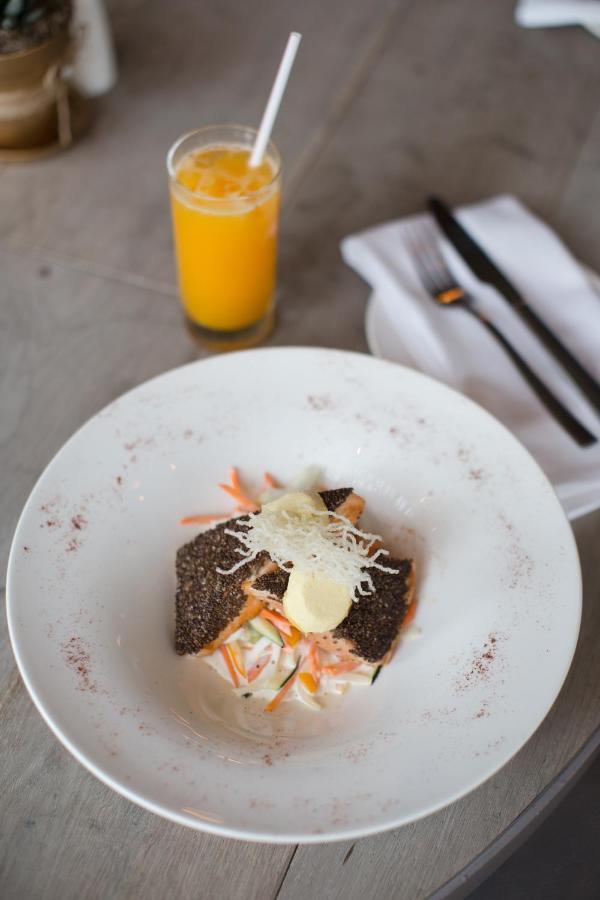 Hotel Las Americas Golden Tower Panama Exterior photo A plate of salmon with a glass of orange juice